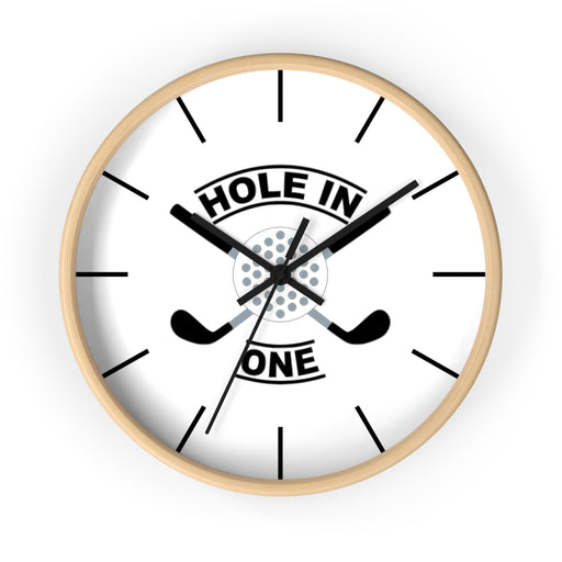 The Hole In One Golf Wall Clock — Golfers’ Decorative Clock features a light wood frame, crossed golf clubs, a golf ball at the center, and bold "HOLE IN ONE" lettering—perfect for adding a sporty touch to any space.