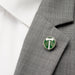 Portland Timbers Lapel Pin pictured on the lapel on a suit jacket.