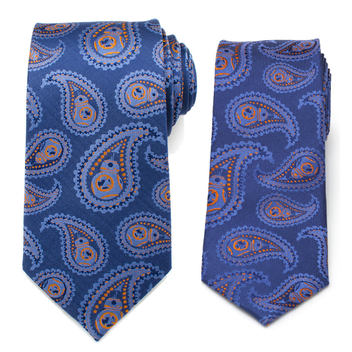 Two silk ties from the Father and Son BB-8 Necktie Gift Set featuring a paisley pattern with accents of orange and light blue. The left tie is rolled with its tip laid flat, while the right tie is folded. Both ties showcase intricate designs with a classic and elegant appearance, making them perfect matching accessories for any formal occasion.