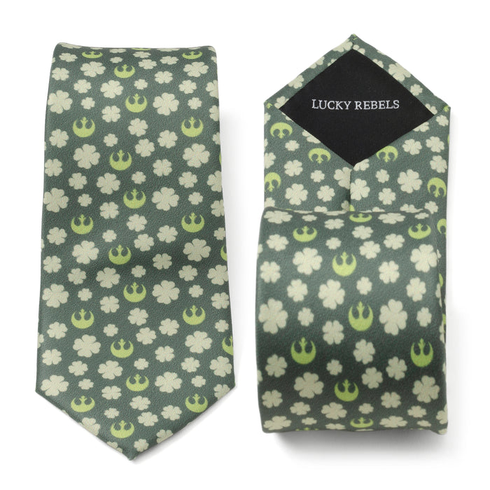 The Rebel Shamrock Green Hidden Message Men's Tie is a green tie adorned with white shamrocks and lime green Rebel Alliance symbols, making it perfect for Saint Patrick's Day. Flip the end to reveal a black lining labeled "LUCKY REBELS" in white text, adding a unique touch to this festive accessory.