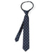 A dark blue Navy silk tie, named "The Child Dotted Navy Boy's Zipper Tie," adorned with a small green geometric pattern. The classic knot showcases the narrow end draped over the wider end, all set against a plain white background.