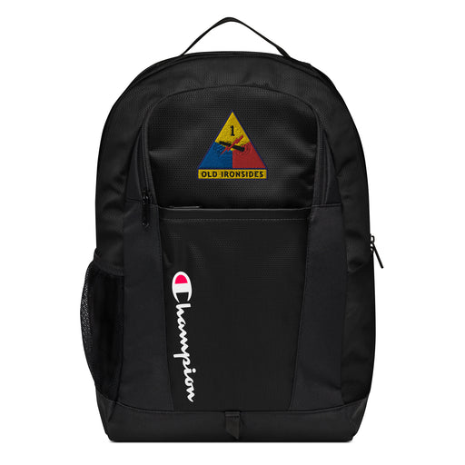 The 1st Armored Division Champion Backpack in black showcases a "Champion" logo, a mesh side pocket, a top handle and a 1st Armored Division logo on the front. Crafted from water-resistant material, this sports backpack is ideal for all-weather use.