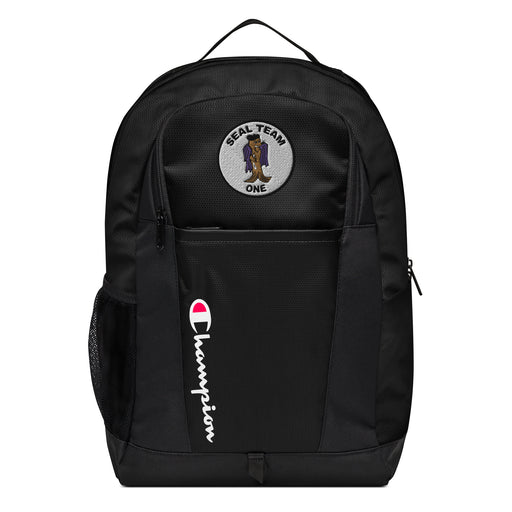 The Seal Team 1 Champion Backpack in black showcases a "Champion" logo, a mesh side pocket, a top handle and a Seal Team 1 logo on the front. Crafted from water-resistant material, this sports backpack is ideal for all-weather use.