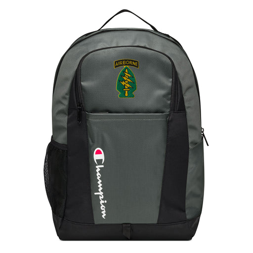 The Special Forces Airborne Champion Backpack in gray and black showcases a "Champion" logo, a mesh side pocket, a top handle and a Special Forces Airborne logo on the front. Crafted from water-resistant material, this sports backpack is ideal for all-weather use.