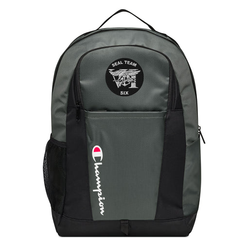 The Navy Seal Team 6 Champion Backpack in gray and black showcases a "Champion" logo, a mesh side pocket, a top handle and a Navy Seal Team 6 logo on the front. Crafted from water-resistant material, this sports backpack is ideal for all-weather use.