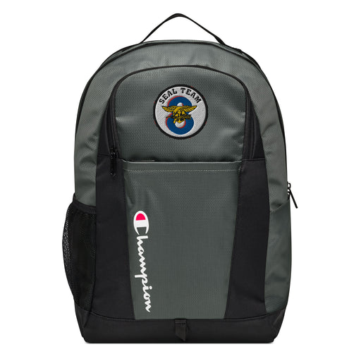 The Navy Seal Team 8 Champion Backpack in gray and black showcases a "Champion" logo, a mesh side pocket, a top handle and a Navy Seal Team 8 logo on the front. Crafted from water-resistant material, this sports backpack is ideal for all-weather use.