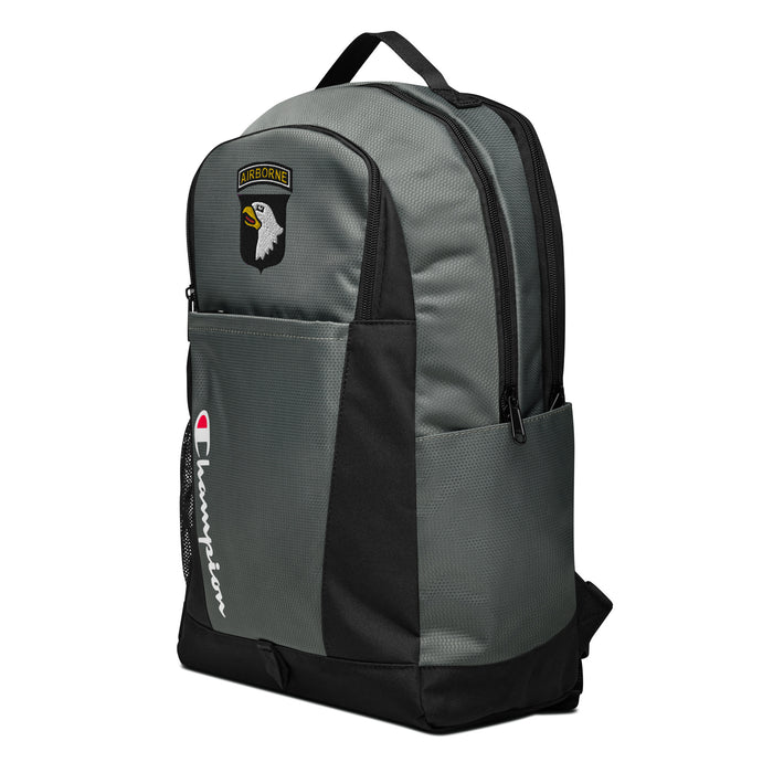 The 101st Airborne Champion Backpack, viewed from a right side tilt, features multiple compartments including a front pocket.