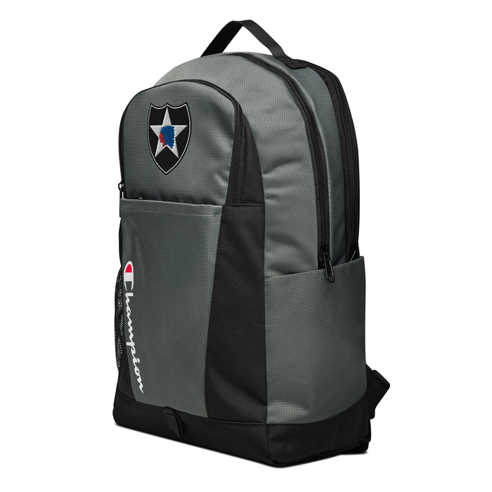 The 2nd Infantry Division Champion Backpack, viewed from a right side tilt, features multiple compartments including a front pocket.