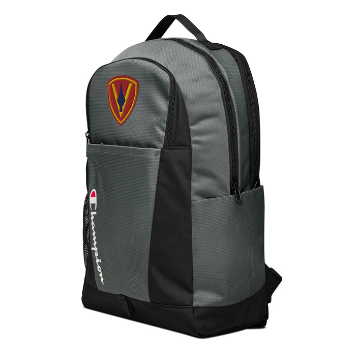 The 5th Marine Division Champion Backpack, viewed from a right side tilt, features multiple compartments including a front pocket.