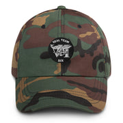 A military style Seal Team 6 Hat with camouflage and the logo on the front.  The hat has a curved visor and an adjustable strap at the back. 