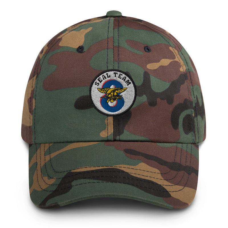 A military style Seal Team 8 Hat with camouflage and the logo on the front.  The hat has a curved visor and an adjustable strap at the back. 