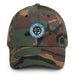 A military style Seal Team 10 Hat with camouflage and the logo on the front.  The hat has a curved visor and an adjustable strap at the back. 