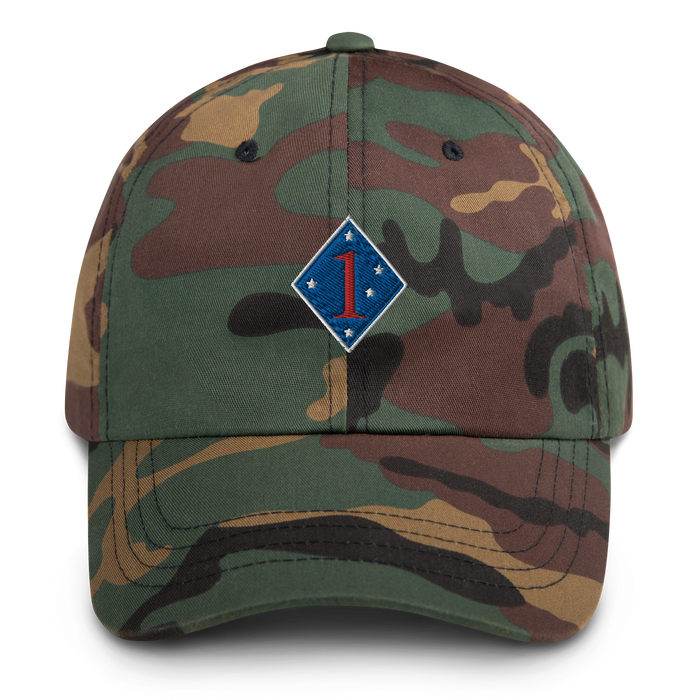 A military style 1st Marine Division Hat with camouflage and the logo on the front.  The hat has a curved visor and an adjustable strap at the back. 
