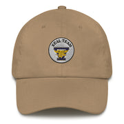 A khaki colored Seal Team 5 Hat with the logo on the front.  The hat has a curved visor and an adjustable strap at the back.