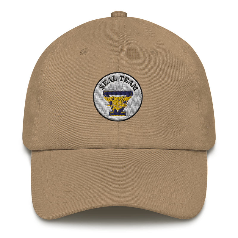 A khaki colored Seal Team 5 Hat with the logo on the front.  The hat has a curved visor and an adjustable strap at the back.