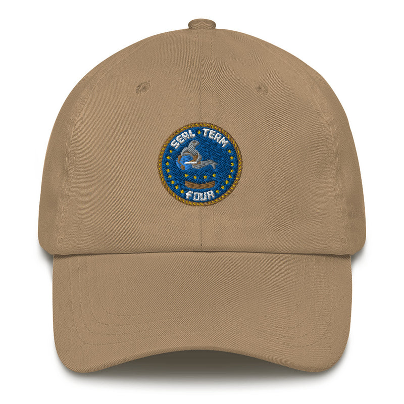 A khaki colored Seal Team 4 Hat with the logo on the front.  The hat has a curved visor and an adjustable strap at the back.