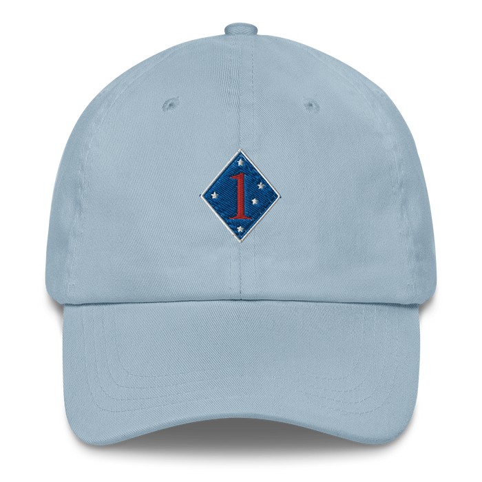 A light blue 1st Marine Division Hat with the logo on the front.  The hat has a curved visor and an adjustable strap at the back.
