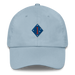 A light blue 1st Marine Division Hat with the logo on the front.  The hat has a curved visor and an adjustable strap at the back.
