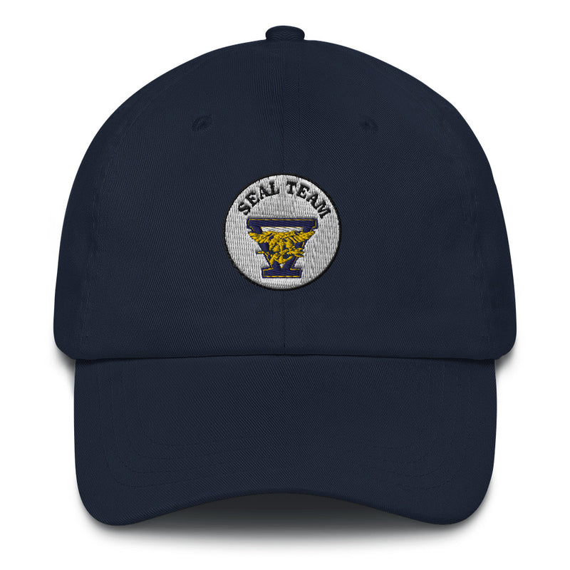 A navy blue Seal Team 5 Hat with the logo on the front.  The hat has a curved visor and an adjustable strap at the back.
