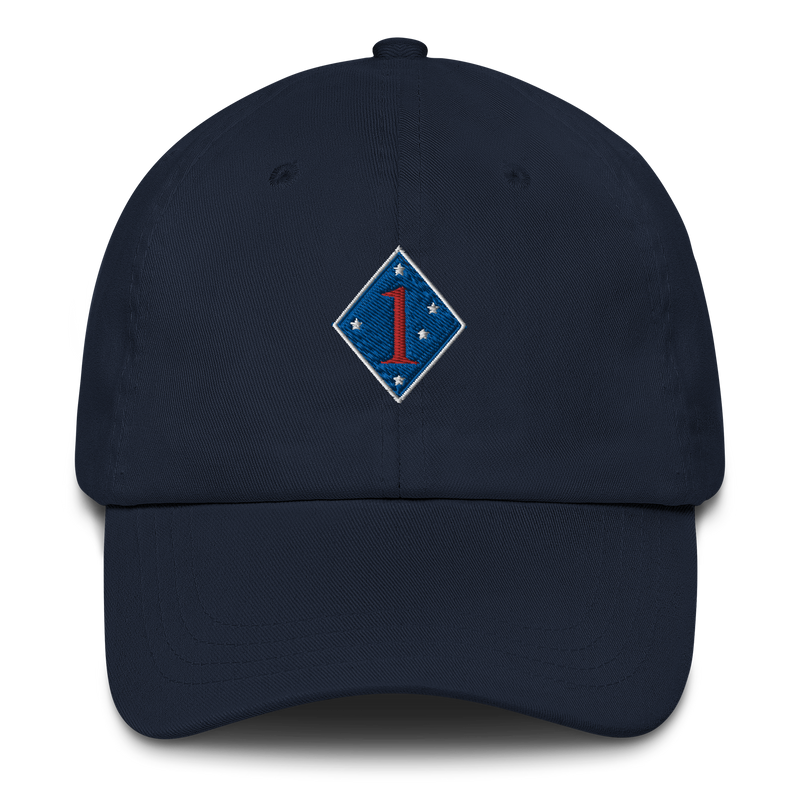 A navy blue 1st Marine Division Hat with the logo on the front.  The hat has a curved visor and an adjustable strap at the back.
