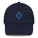 A navy blue 1st Marine Division Hat with the logo on the front.  The hat has a curved visor and an adjustable strap at the back.
