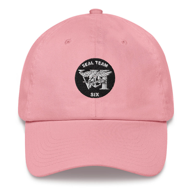 A pink Seal Team 6 Hat with the logo on the front.  The hat has a curved visor and an adjustable strap at the back.