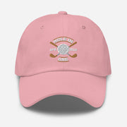 The Golf Hat in pink - Hole in One with Personalized Month and Year features a golf design  including two crossed golf clubs with a golf ball at the center and the text "HOLE IN ONE" above. Customized month and year are on the left and right sides.