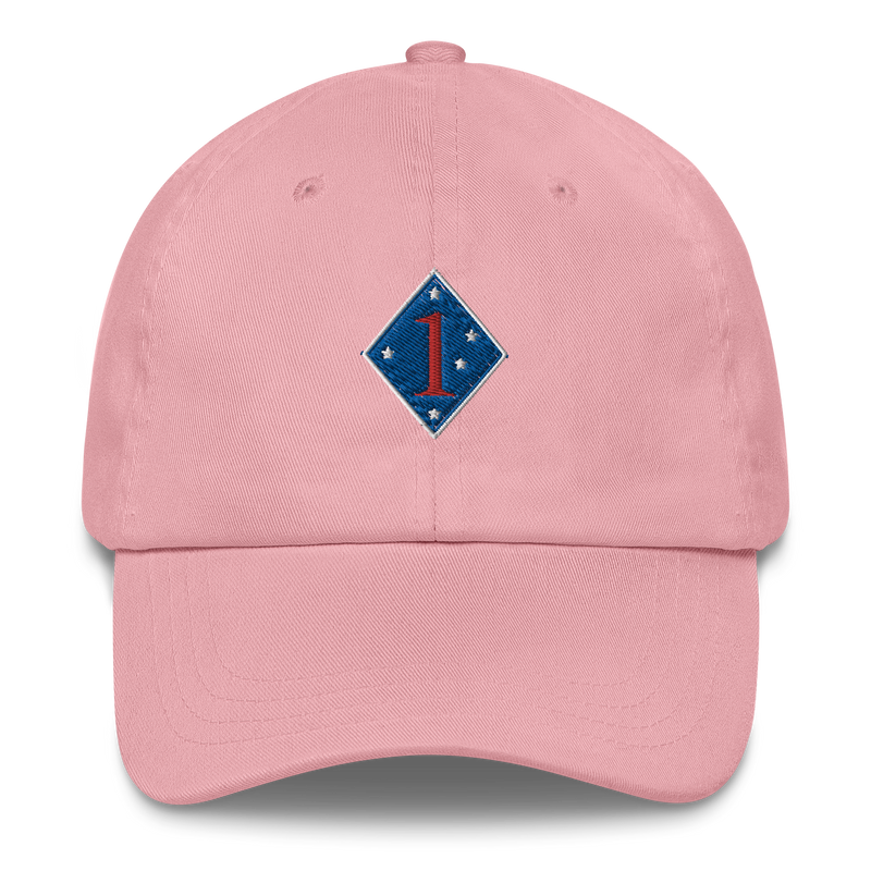 A pink 1st Marine Division Hat with the logo on the front.  The hat has a curved visor and an adjustable strap at the back.
