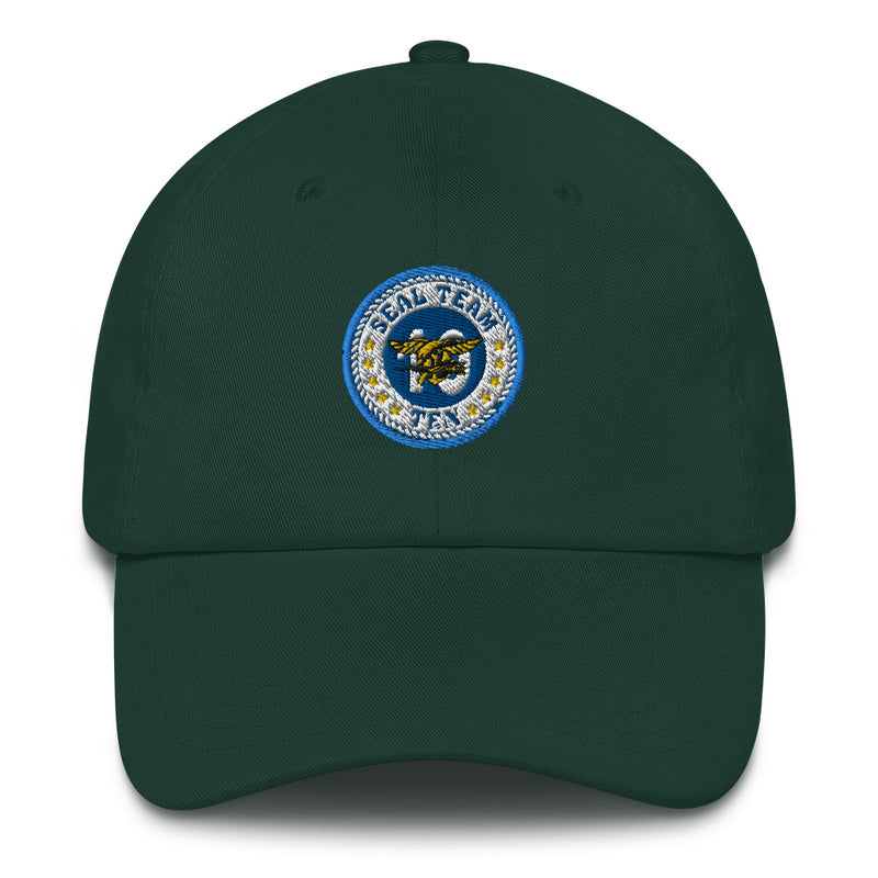A spruce colored Seal Team 10 Hat with the logo on the front.  The hat has a curved visor and an adjustable strap at the back.