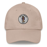 A stone colored Seal Team 1 Hat with the logo on the front.  The hat has a curved visor and an adjustable strap at the back.