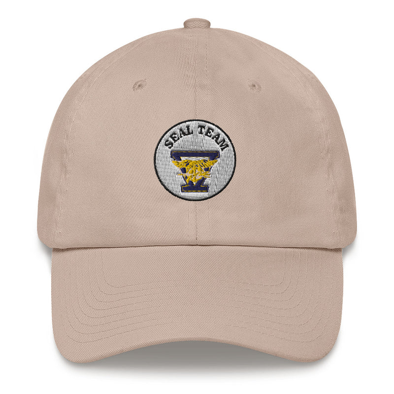 A stone colored Seal Team 5 Hat with the logo on the front.  The hat has a curved visor and an adjustable strap at the back.