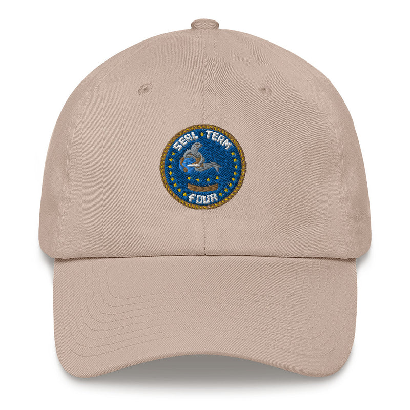 A stone colored Seal Team 4 Hat with the logo on the front.  The hat has a curved visor and an adjustable strap at the back.