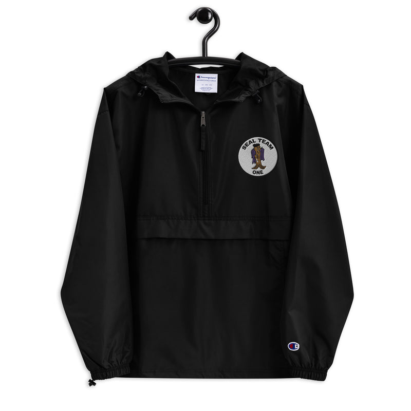 Navy Seal Team 1 Black Champion packable jacket with a detailed embroidered logo