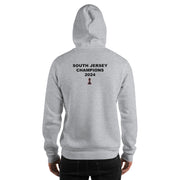 A person is standing with their back to the camera, wearing a Chess Championship gray Hoodie. "South Jersey Champions 2024" is printed on the back. Below the text  is an image of a chess rook.