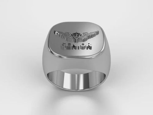 A video illustrating a sleek silver men's military style signet ring with a raised Senior Flight Surgeon Badge logo rotating on a 360 degree turn table.