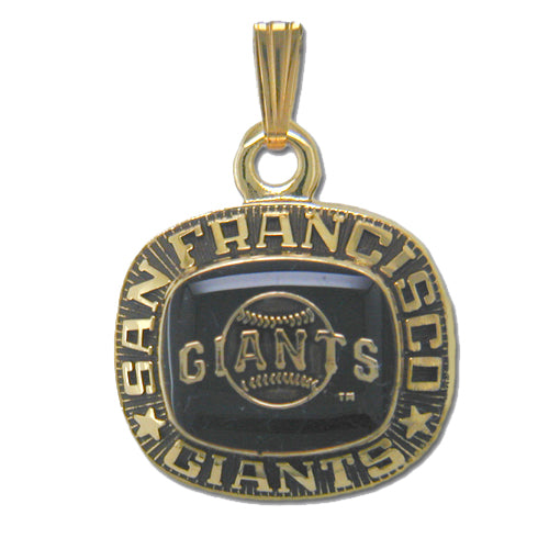 The San Francisco Giants Goldtone Pendant with Enamel, shaped like a championship ring, features a black rectangular center inscribed with a baseball and the word 'GIANTS.' The outer edge is engraved with 'SAN FRANCISCO GIANTS,' and it has a loop at the top for a chain.