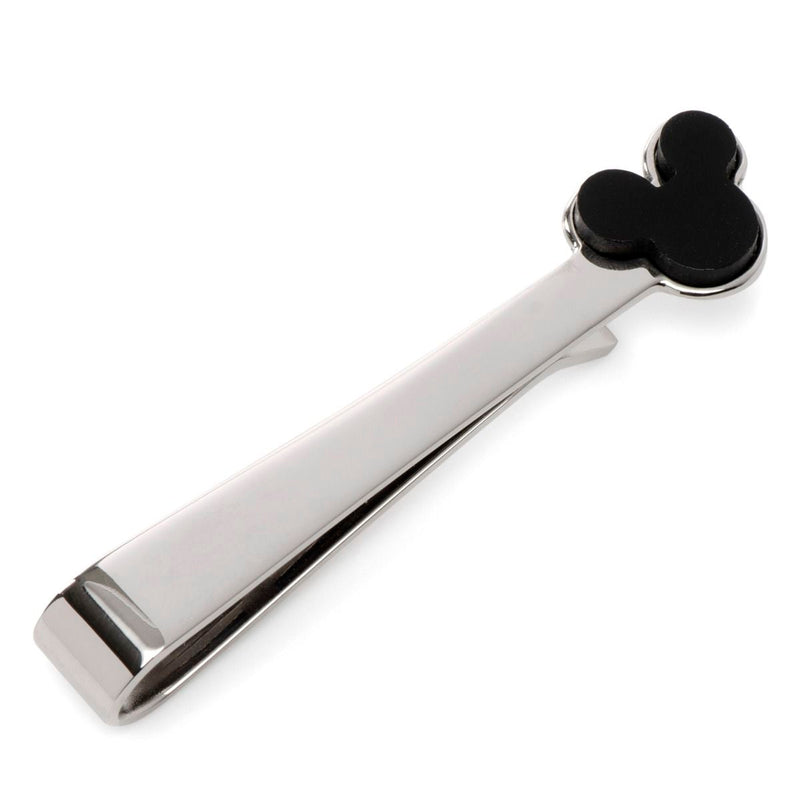A pair of sleek, silver-colored metal tongs with a handle featuring a black, stylized silhouette of Mickey Mouse's head at the top. The design is simple and modern, with clean lines and a shiny finish that evokes the elegance of the Mickey Mouse Onyx Stainless Steel Tie Bar and adds a touch of Disney magic.