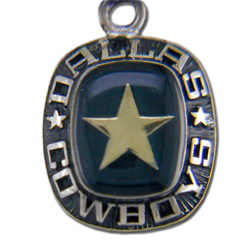 The Dallas Cowboys Celestrium Pendant with Enamel features a silver star encircled by "DALLAS COWBOYS," proudly representing the Dallas Cowboys football team.