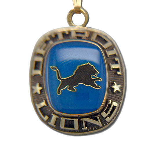 The Detroit Lions Goldtone Pendant with Enamel features a blue center with a black lion silhouette and "DETROIT LIONS" on the border, accented by two stars—an iconic piece from Balfour Sports.
