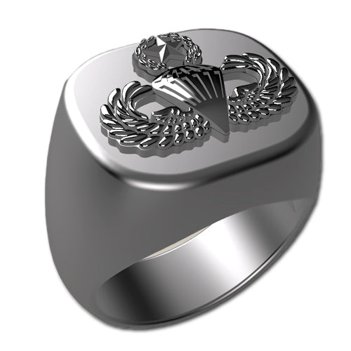 A sleek silver men's military style signet ring with a raised Master Parachutist Badge logo on top and boasting a modern, polished finish.