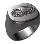 A sleek silver men's military style signet ring with a raised Basic Parachutist Badge logo on top and boasting a modern, polished finish.