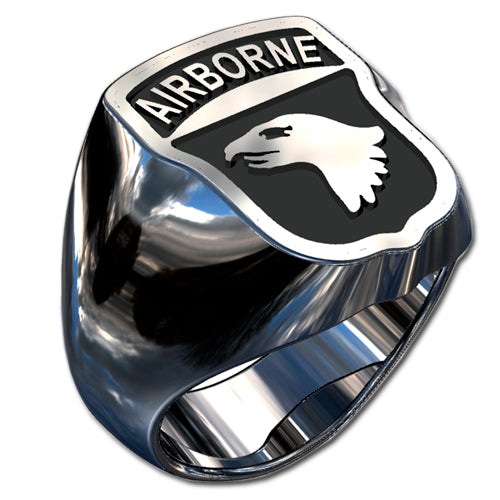 A sleek silver men's military style ring with a raised 101st Airborne Division Badge logo with enamel on top and boasting a modern, polished finish.