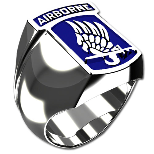 A sleek silver men's military style rectangular ring with a raised 173rd Airborne Brigade Combat Team logo with enamel on top and boasting a modern, polished finish.