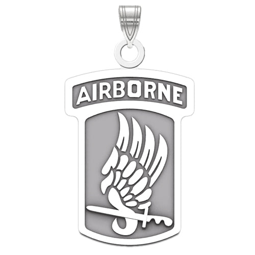 The 173rd Airborne Brigade Sterling Silver Pendant showcases an emblem with an arching "AIRBORNE" banner at the top and a stylized winged sword on a shield-like background.