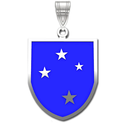 The 23rd Infantry Division Sterling Silver Pendant with enamel is shaped like a shield with a blue background. The shield shows four white stars bordered by silver edges.