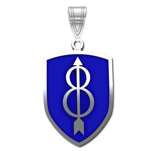 The 8th Infantry Division Sterling Silver Pendant with enamel is a shield-shaped pendant with a blue background. It shows a silver design of a vertical arrow intersecting two overlapping circles that extend beyond their top and bottom.