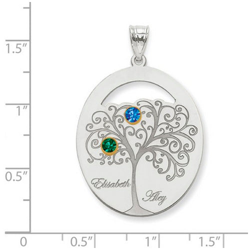 Family Tree Oval Silver Pendant With 2 Birthstones. The pendant is shown on a ruled background.