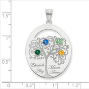 An Oval Silver Pendant With 4 Birthstones, featuring a detailed tree design with four colorful gems. Each branch holds a birthstone and a name. The pendant is shown on a ruled background.