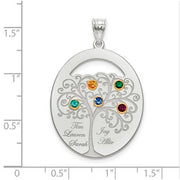 An Oval Silver Pendant With 5 Birthstones, featuring a detailed tree design with four colorful gems. Each branch holds a birthstone and a name. The pendant is shown on a ruled background.