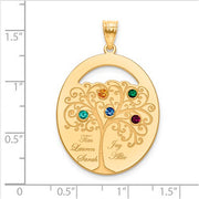 An Oval Silver Pendant With 5 Birthstones, featuring a detailed tree design with four colorful gems. Each branch holds a birthstone and a name. The pendant is shown on a ruled background.